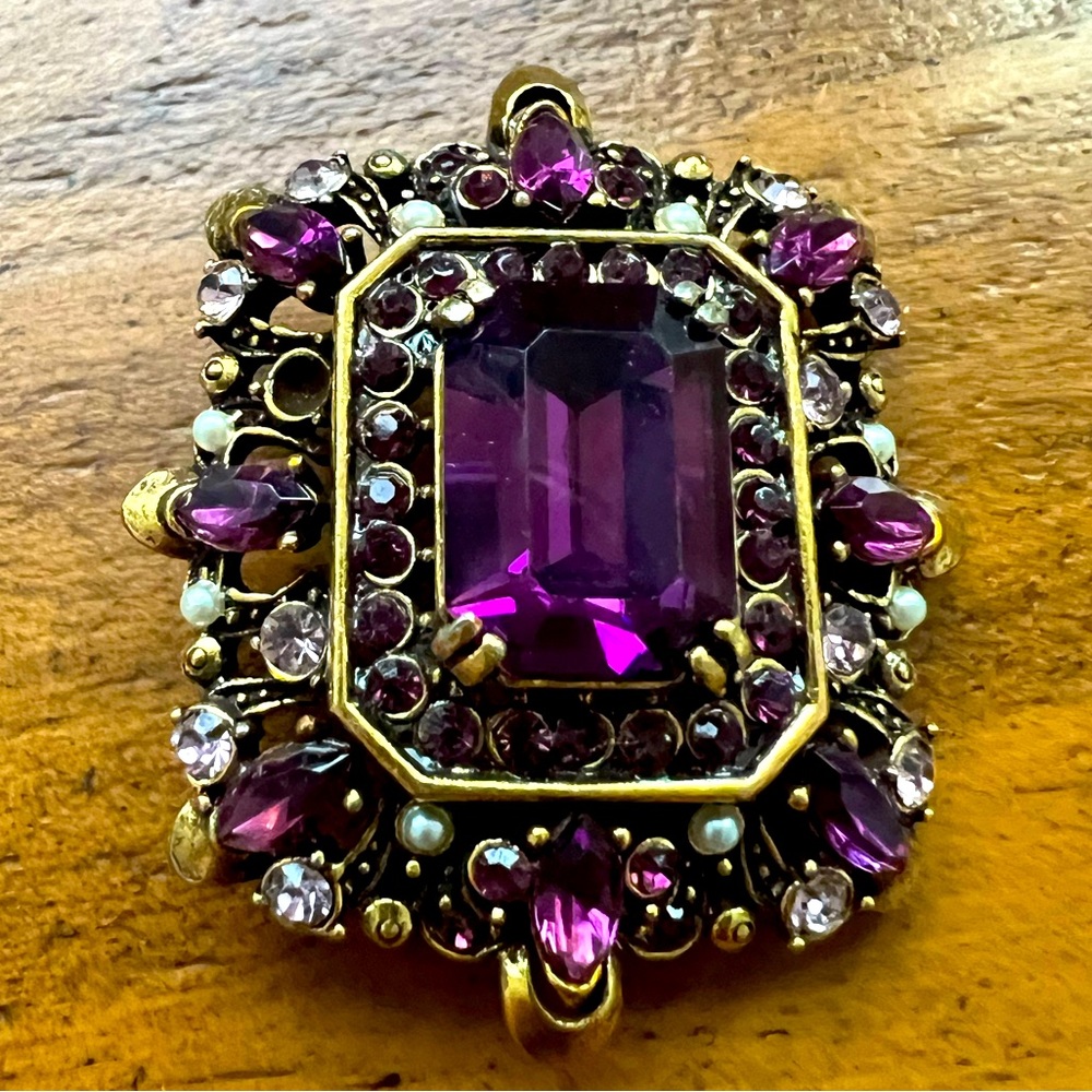 Vintage pronged brooch with purple glass beads